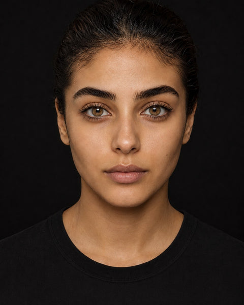 A noticeable honey lens shown on a dark brown Egyptian eye